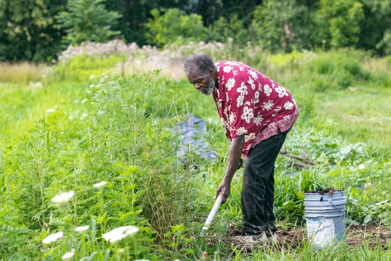 Uncle Ephraim gardening outdoors