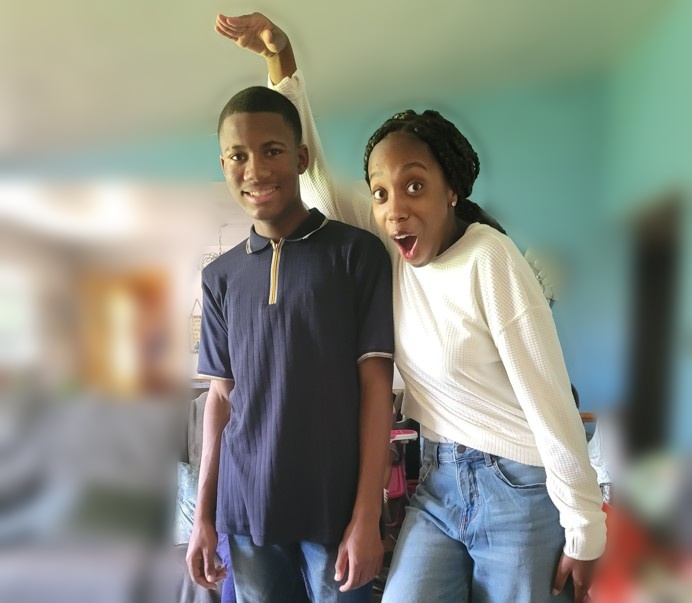 Jelani and Azaria sharing a playful moment at home