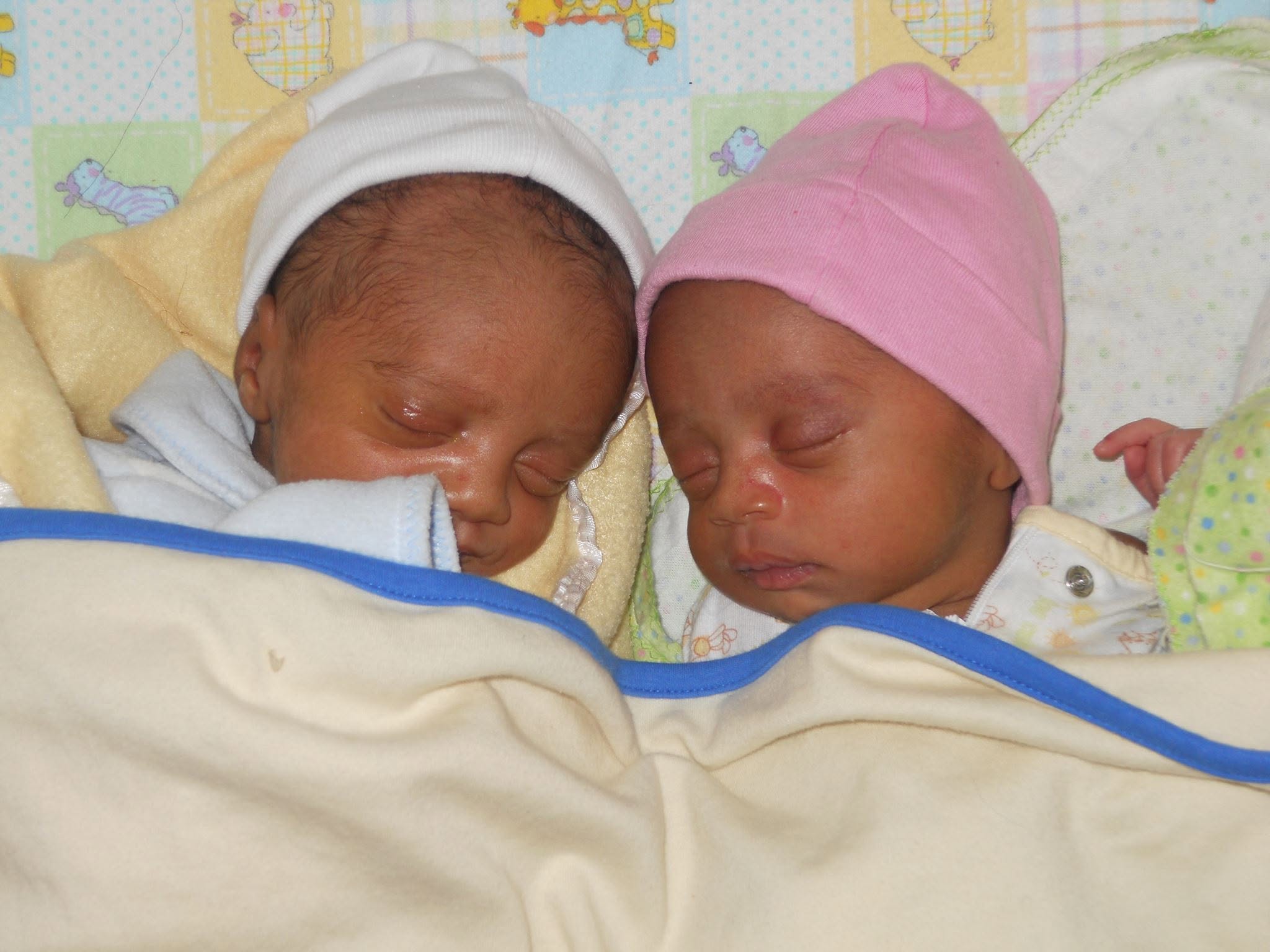 Jelani and Azaria sleeping side by side as newborns